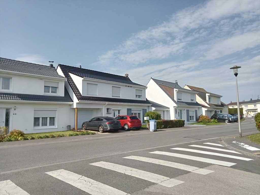 A Famars Réfection de toiture, surélévation du garage en ossature bois, bardage PVC,création d’une chambre et d’un cellier 12
